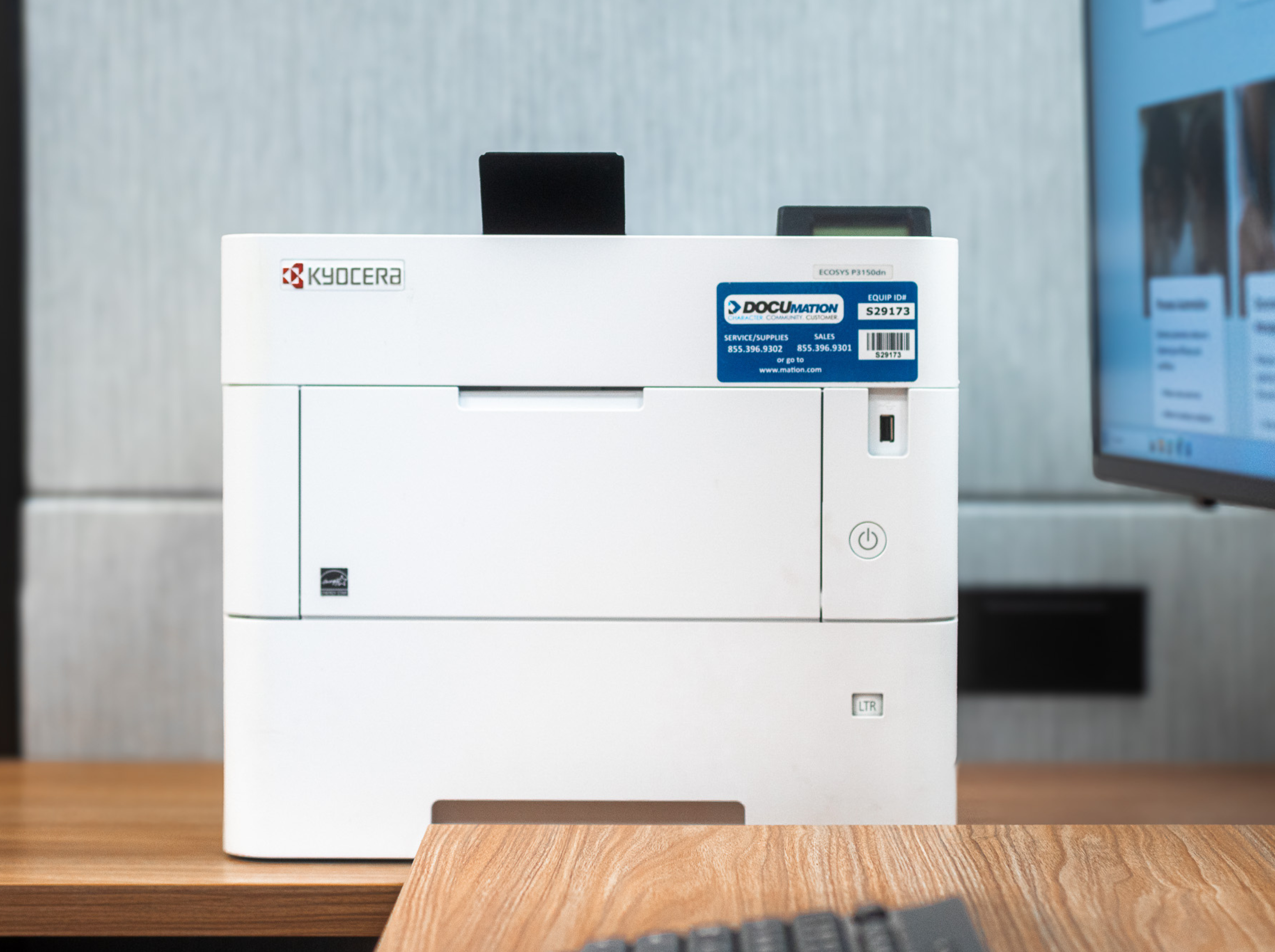 Kyocera printer with a DOcumation label.